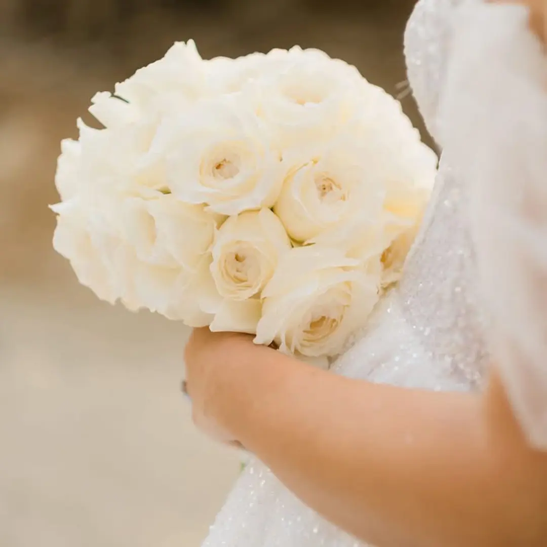 beige wedding flower bouquet designed by gold and silver events